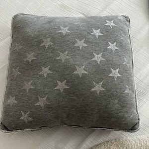 Dormify gray square pillow with silver stars and silver trim